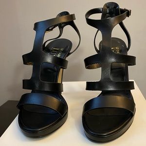 Black strappy heels. Brand new. Size 8. Le Chateau